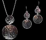 Pendant and earrings in Samba Double Disc design